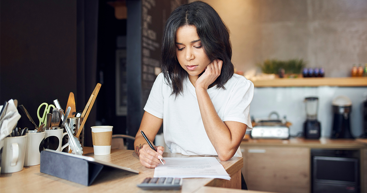 woman reviewing business costs