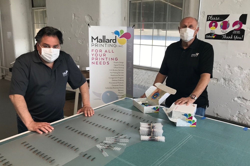 Mallard Printing Owners Jeff Marques and Bob Lunquest Wearing Some of Their Disposable COVID-19 Masks