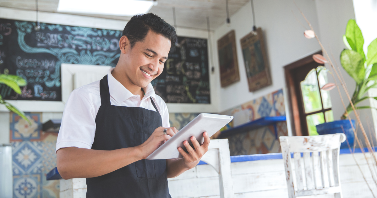 business owner on tablet